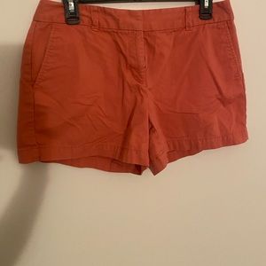 Used. Ann Taylor Loft size 6. Not sure on the exact color, like a coral color.
